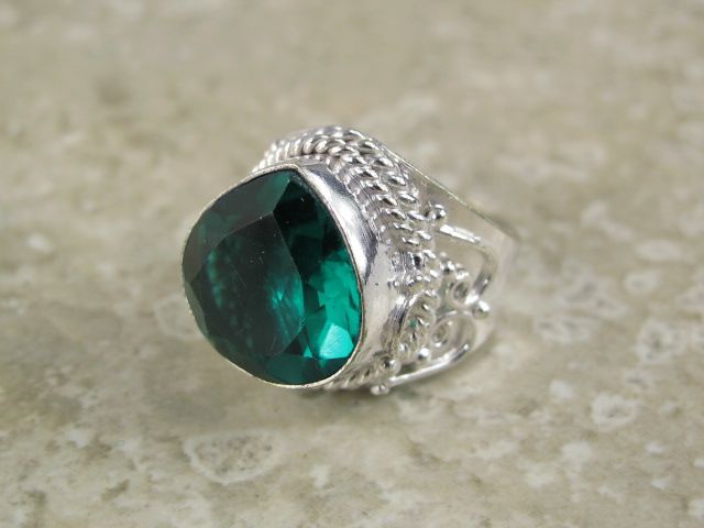 silver ring (size 7.25) with  faceted green tourmaline like quartz 