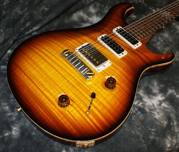 model modern eagle ltd body ribboned mahogany top private stock grade 