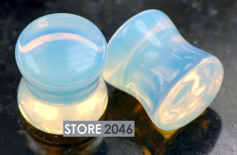   pair of opal stone ear plugs size 00 gauge material quantity 2