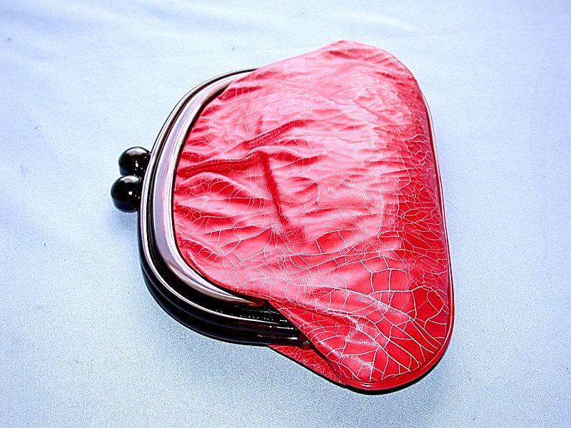 This auction is for a Beautiful Vintage Amber Bakelite Plastic Red 