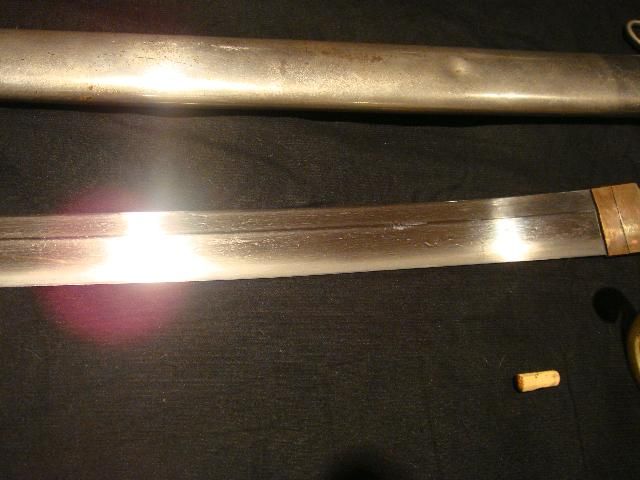 This supper shape blade measures roughly 22 from tip to guard 