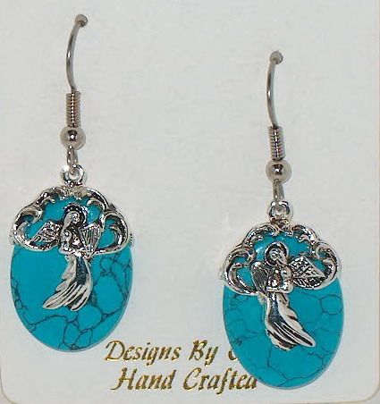 These unique Faux Turquoise & Silver earring pendants measure 1 in 